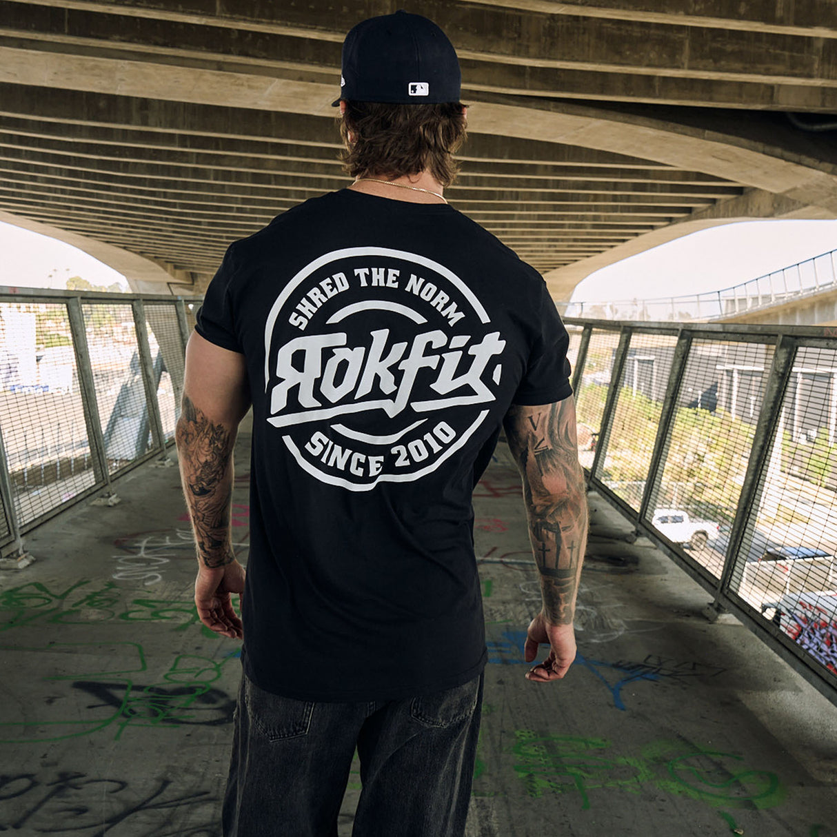 Shred The Norm Badge - Active Tee