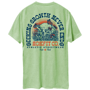 Back view of unisex heather green Active Tee with 'Seeking Growth Never Ends' graphic