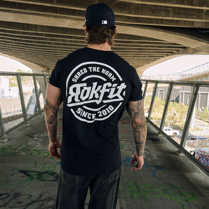 Shred The Norm Badge - Active Tee